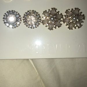 two pairs of earrings